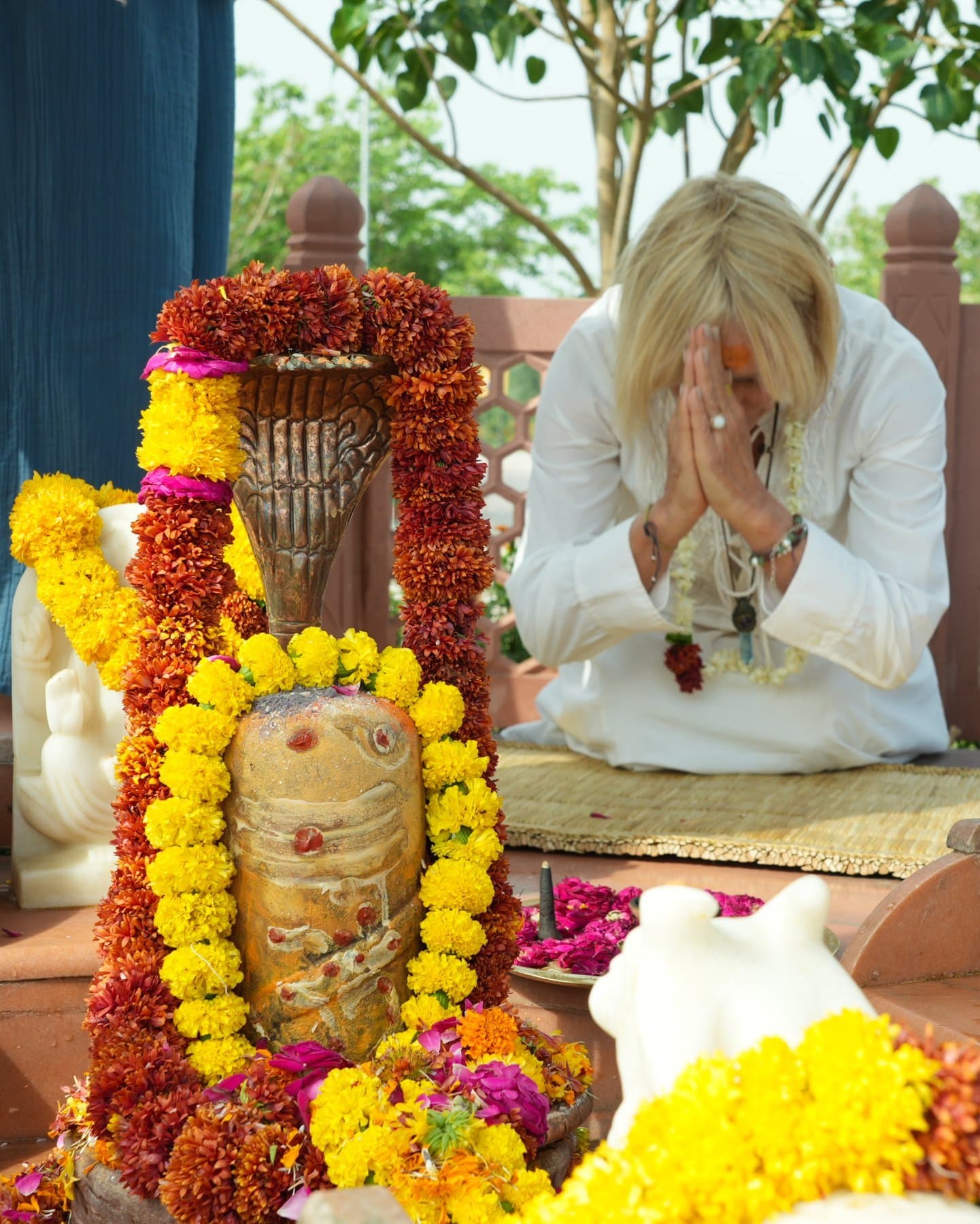 Prayer at the marigold shrine